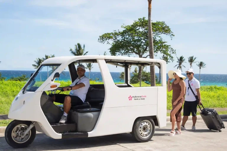 Travelers boarding a Boracay airport transfer service