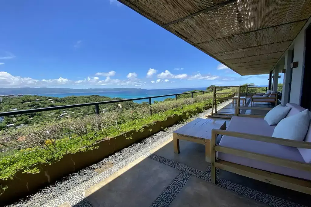 Terrace with daybeds and sea view