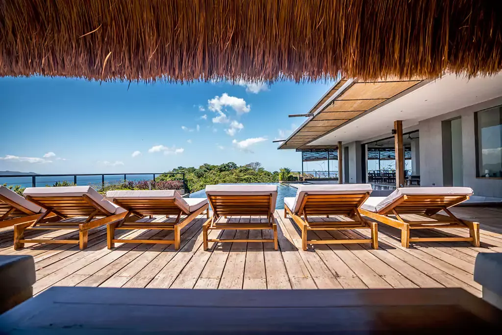 Sun loungers on the wooden deck