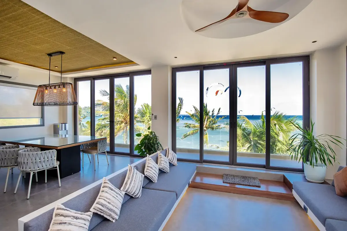 Sunken lounge and dining area with sea view
