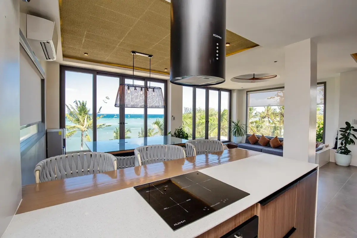 Kitchen island with induction hob and sea view