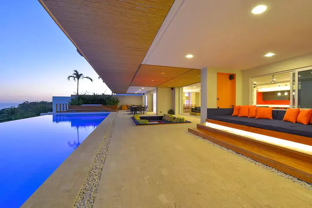 Poolside terrace lounge at sunset