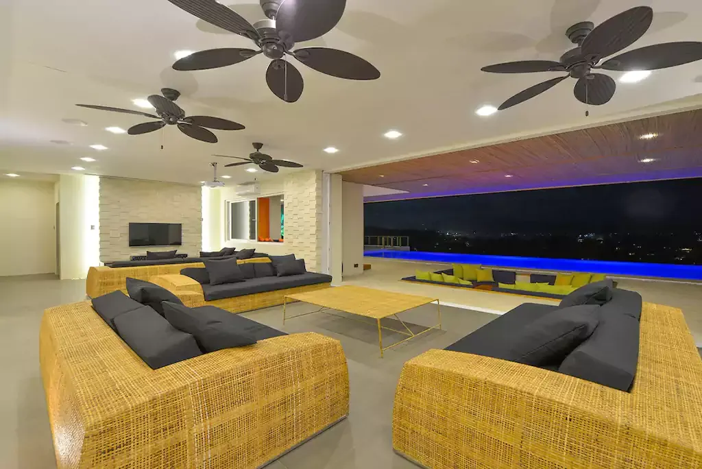 Open-plan lounge with large TV